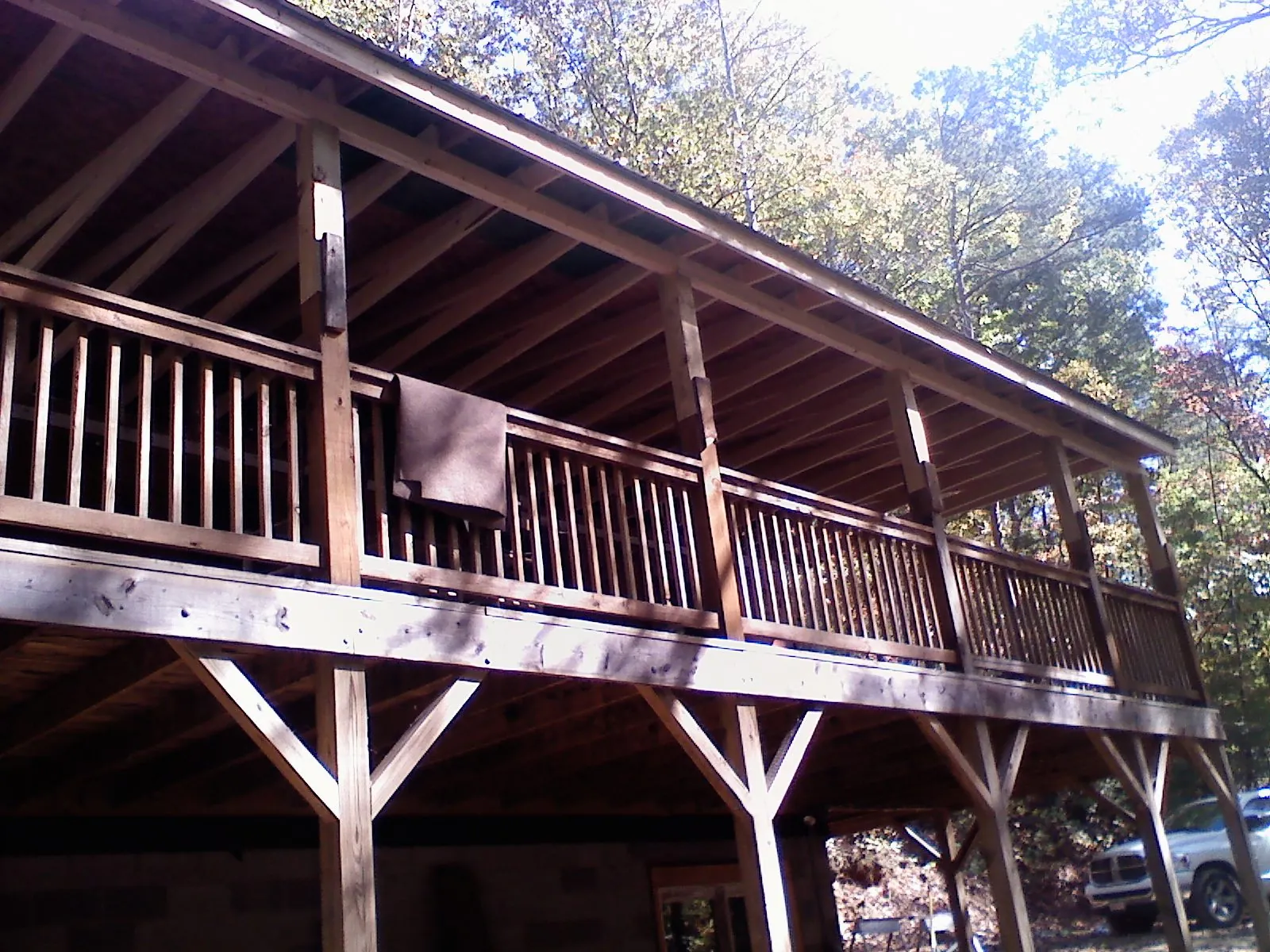 Timber framing under a new elevated porch and deck — Roof Leak Repair in New Gloucester by Roofing Brothers